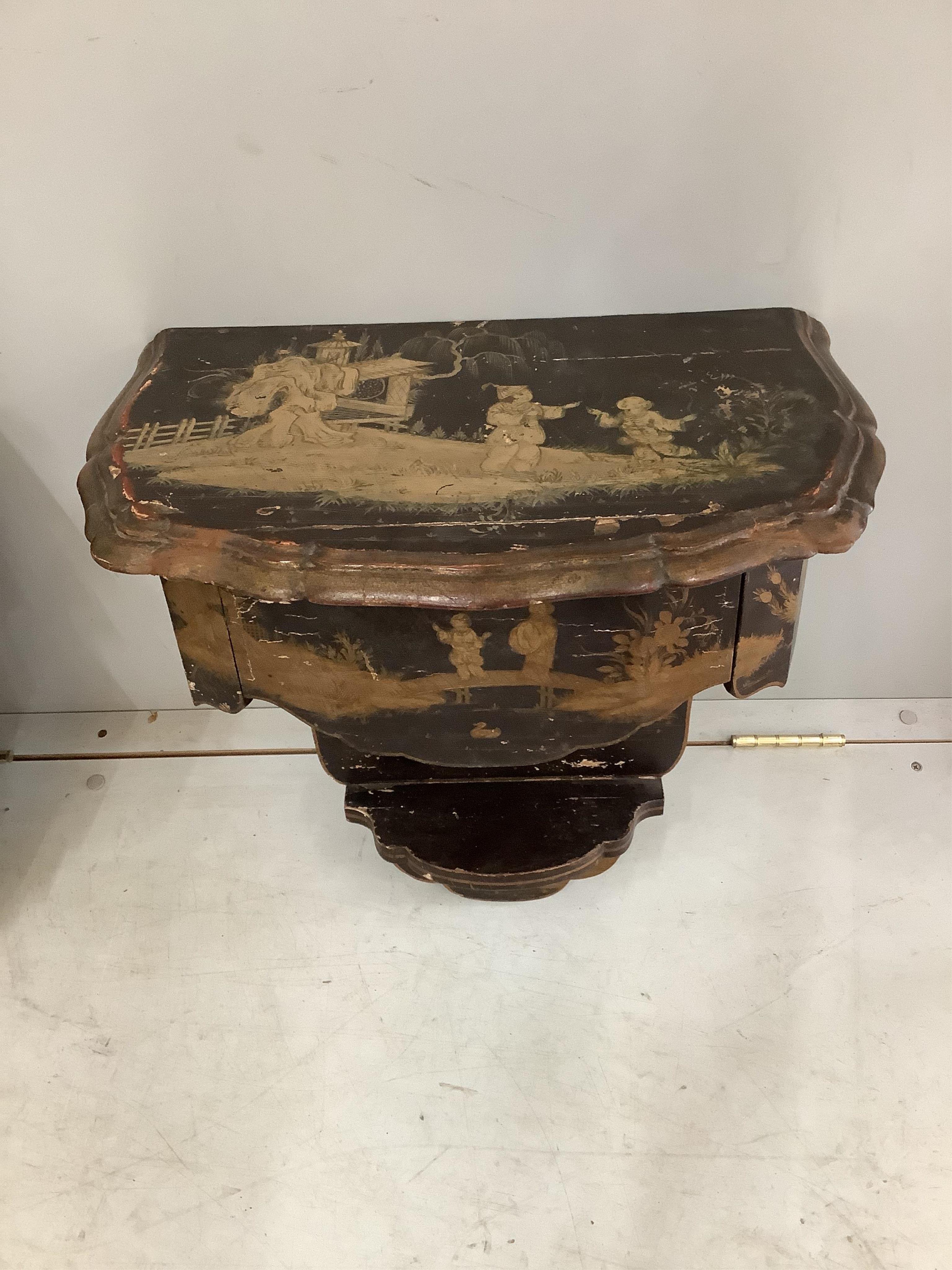 A pair of chinoiserie lacquer wall brackets each fitted single drawer, width 44cm, depth 29cm, height 56cm